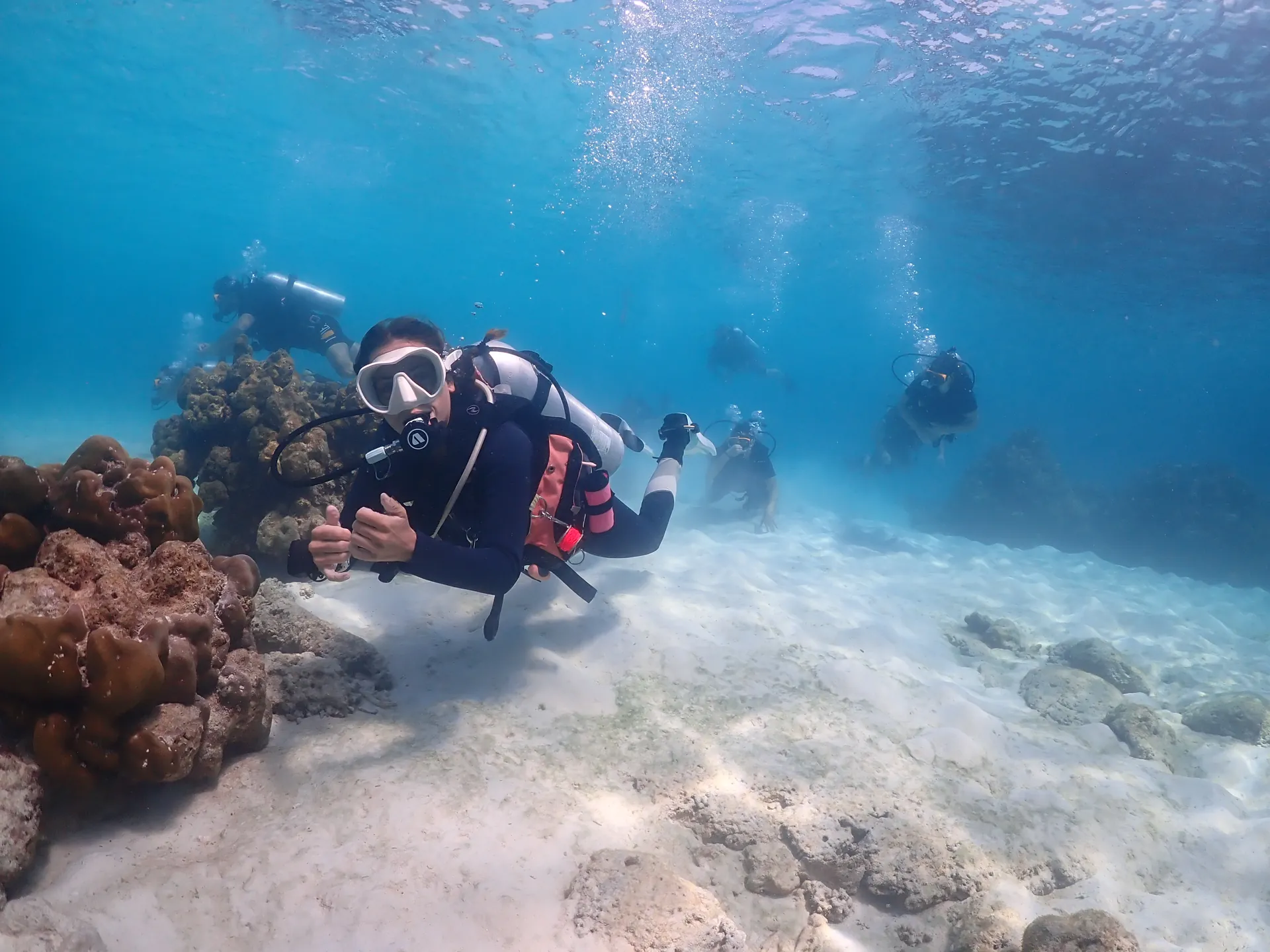 Diver refreshing skills in calm water