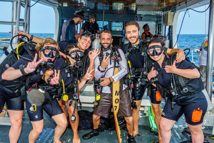 Try dive group celebrating on the boat