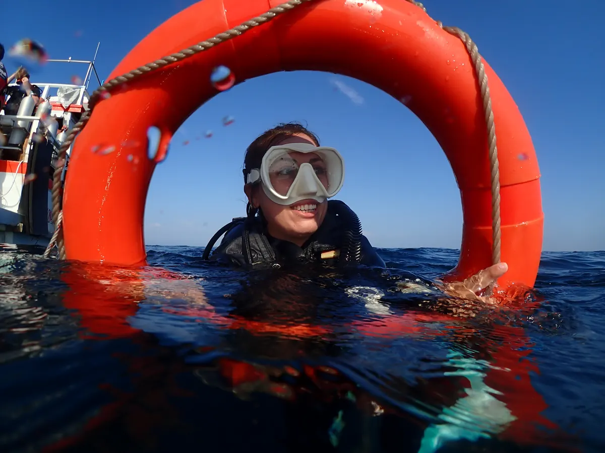 Rescue diver training at the surface with a rescue ring in Koh Lipe