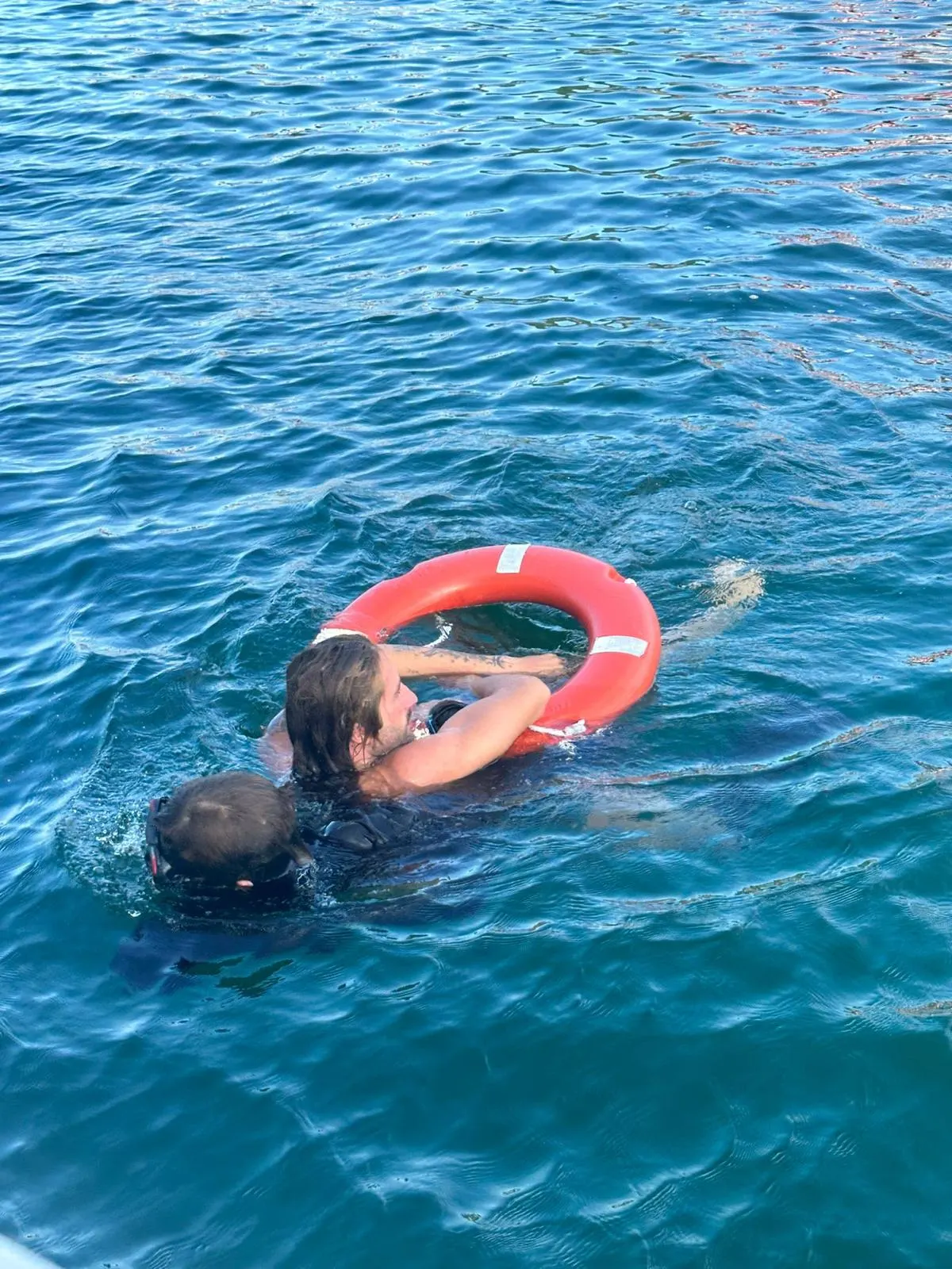Rescue scenario — towing a diver to safety with the lifering