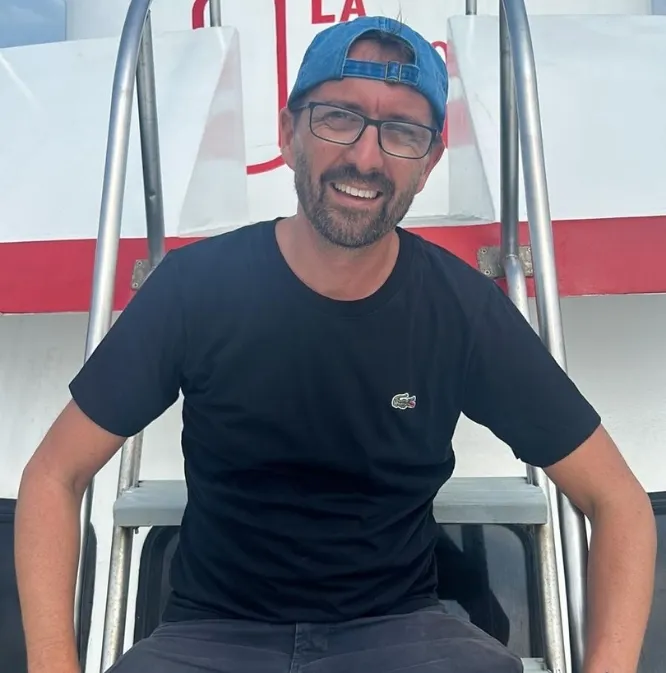 Bryan smiling on the La Bombona Diving boat