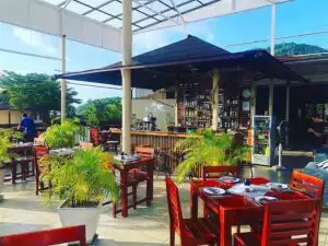The roof terrace of Barracuda Rooftop Restaurant & Bar in Koh Tao, with tables set for dinner