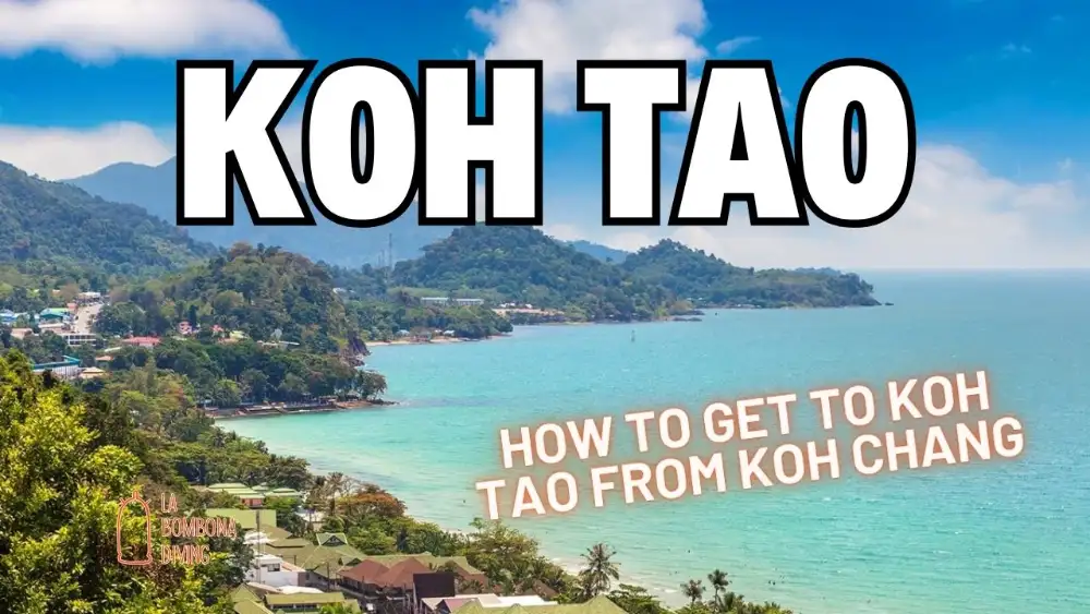 Elevated view of a curving beach and green hills on Koh Chang with turquoise water, overlaid with the words "Koh Tao — How to Get to Koh Tao from Koh Chang"