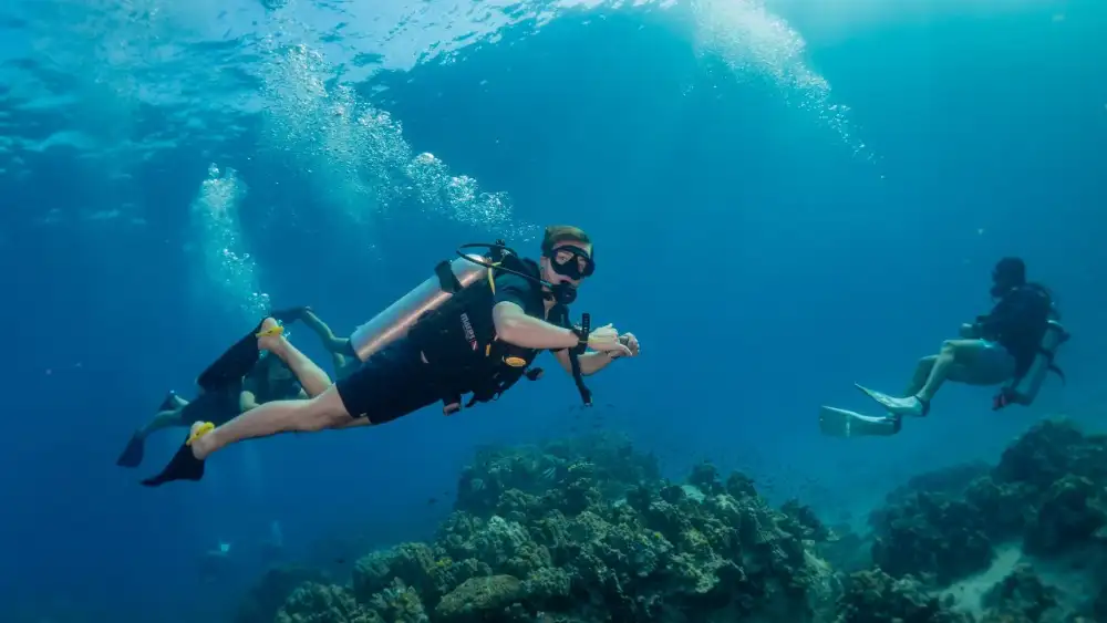 Divemaster training in Koh Tao — a candidate practising skills underwater with an instructor